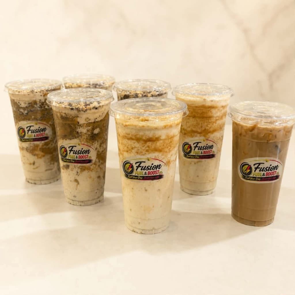 Fusion Fuel & Boost Co. protein shakes — branded cups with assorted flavors